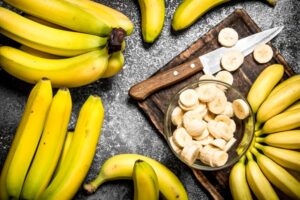 how to freeze bananas for smoothies with sliced bananas on tray