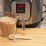 Best instant pots with a jug of rice next to it