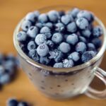 Frozen blueberries in a cup