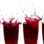 MetaBoost power shots with raspberry juice in glasses