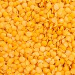Yellow lentils on the whole page