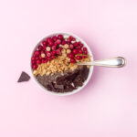 Chia seed breakfast bowl with berries, nuts, seeds