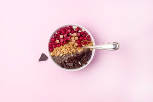 Chia seed breakfast bowl with berries, nuts, seeds